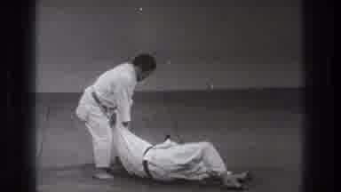 Tokyo Japan (1971): A Man Practicing And Demonstrating A Karate Move With His