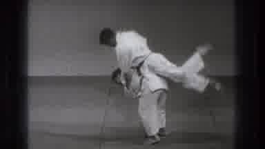 Tokyo Japan (1971): Slow Motion View Of Man Flipping Person Onto Grey Floor Mat
