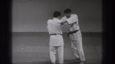 Tokyo Japan (1971): Two Men Practice Positioning For Judo Hip Toss On Mats