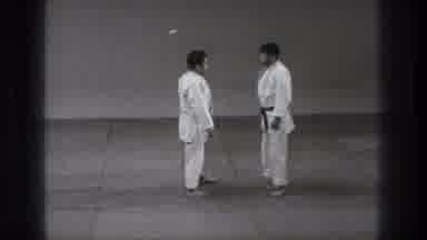 Tokyo Japan (1971): One Gentleman Is Showing Another Gentleman How To Walk In