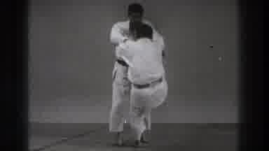 Tokyo Japan (1971): Two People Practicing Karate Slowly In The Center