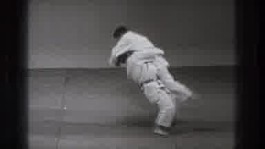 Tokyo Japan (1971): Slow Motion View Of Man Wearing White Karate Uniform Flipping