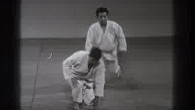 Tokyo Japan (1971): Two People Are Getting Back Up On Their Feet Again