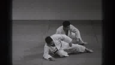 Tokyo Japan (1971): Two Men Getting Up For Slow Motion Karate Match