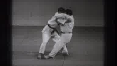 Tokyo Japan (1971): Two Men Falling While Practicing Martial Arts In Black And