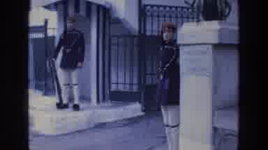 ATHENS GREECE-1976: Guards in Traditional Uniforms Near Busy Road