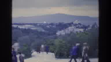 ATHENS GREECE-1976: Tourists Walking On Hillside Path With Acropolis View