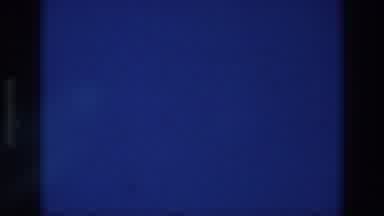 ATHENS GREECE-1976: Blank Blue Screen Loop with Film Grain