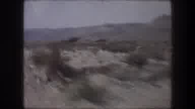 Bethlehem Israel (1976): High Speed Driving In Desert With Shrubs And Mountain