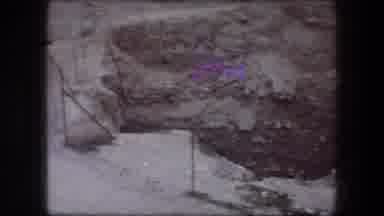Jericho Israel (1976): A Field Of Rock With A Large Deep Pit In The Daytime