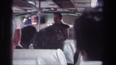 Jerusalem Israel (1976): People Are Traveling In The Bus Guide Giving Instructions