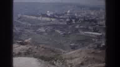 Jerusalem Israel (1976): View Of Green Hills Tan Wall And Seawater On A Clear Day