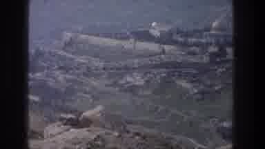 Jerusalem Israel (1976): Wide Shot Of A Rocky Landscape With A Walled City In The