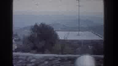 Jerusalem Israel (1976): The View From Above Of A Building Top And A Telephone