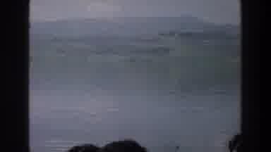 Sea of Galilee Israel (1976): Tops Of People's Heads Facing Nearly Calm Lake Then