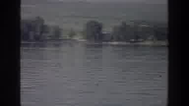 Sea of Galilee Israel (1976): View Of Blue Lake Water Trees And Small White