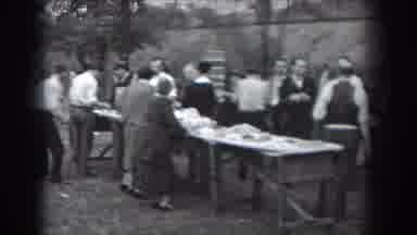 Reading Pennsylvania (1938): People Gathered At Wooden Tables Laden With Food On A