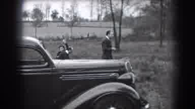 Reading Pennsylvania (1938): Two Adult Men And A Child Who Greets The Camera
