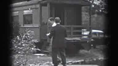 Reading Pennsylvania (1938): Two Men Walking Up To A House