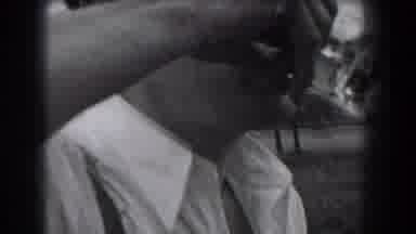 Reading Pennsylvania (1938): Man Wearing White Shirt Guzzles Down Beverage From