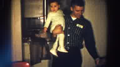 Aliquippa Pennsylvania-1958: Father Holding One Small Kid In One Hand And Also