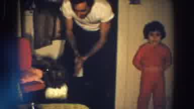 Aliquippa Pennsylvania (1958): Caucasian Adult Male In White Shirt Kneels By