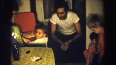 Aliquippa Pennsylvania (1958): Group Of Kids Playing With Father And Doll At Home