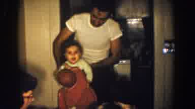 Aliquippa Pennsylvania (1958): A Man Interacting With Two Children In A Home