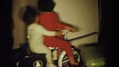 Aliquippa Pennsylvania (1958): A Young Girl On A Tricycle With A Younger Child On