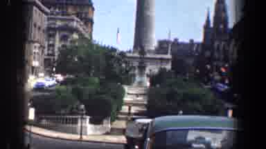 Washington DC (1961): View Of Green Car And Building Spire Against Blue Sky