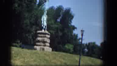 Washington DC (1961): Driving Slowly Past A Statue While Other Cars Drive By