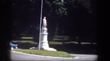 Washington DC (1961): Driving Past A Statue And A House With A Solar Panel On Its