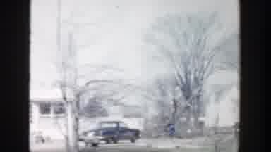 Grand Rapids Michigan (1956): A Neighborhood On A Snowy Day With People Walking By