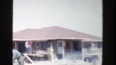 Grand Rapids Michigan (1956): Right To Left Pan Of Woodpile With House In Distance