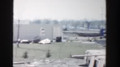 Grand Rapids Michigan (1956): Word Down Buildings And Two People Working On A