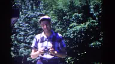 French Lick Indiana (1958): Man In Some Green Park Ready With The Camera To