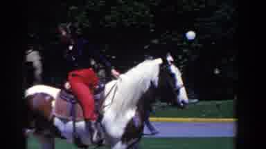 French Lick Indiana (1958): Person Wearing Red Pants Rides Horse On A Bright Sunny