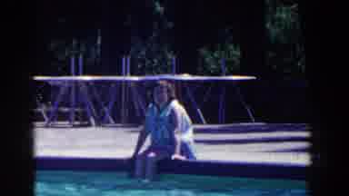 French Lick Indiana (1958): Woman Sitting By The Pool And Another Woman Walking