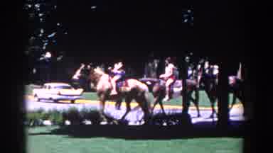 French Lick Indiana (1958): People On Horseback Touring Around City With Horse