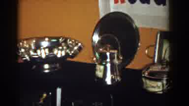 French Lick Indiana (1958): View Of Gold Trophies Displayed On Brown Wood And