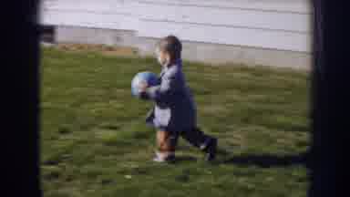 Nebraska (1956): Kid Running With Ball On Backyard In House Then Runs To His