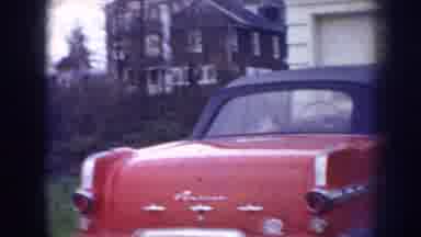 Nebraska (1956): The Premises Of A Building With A Car Parked Near To The Entrance