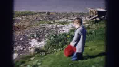 Nebraska (1956): Boy Plays On The Garden And Gives His Dad A Cap