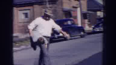 Nebraska (1956): Grandson Runs Across The Street And Grandpa Carries Him Back To