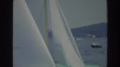 Wisconsin (1966): Sailboats With White Sails Sailing In Sunny Day