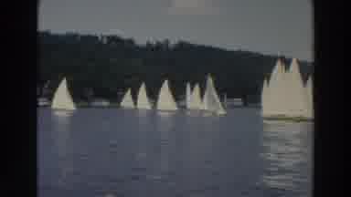 Wisconsin (1966): Several Sail Boats Sailing In A Large Body Of Lake