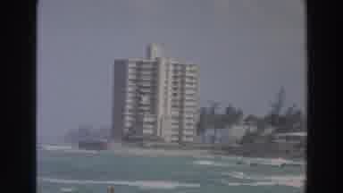 Wisconsin (1966): Scenery Where People Are Enjoying The Beach While The Waves Of