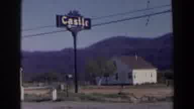 Niagra Falls Canada (1963): Cars Pass An Advertising Roadside Sign Mounted On A