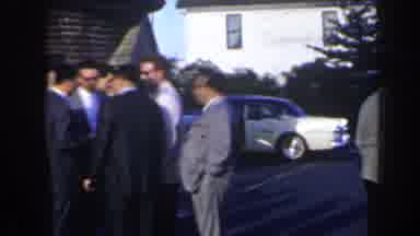 Niagra Falls Canada (1963): Two Groups Of Men In Suits And One Lady Talking In