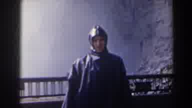 Niagra Falls Canada (1963): A Man Wearing A Rain Slicker Walks With A Waterfall In